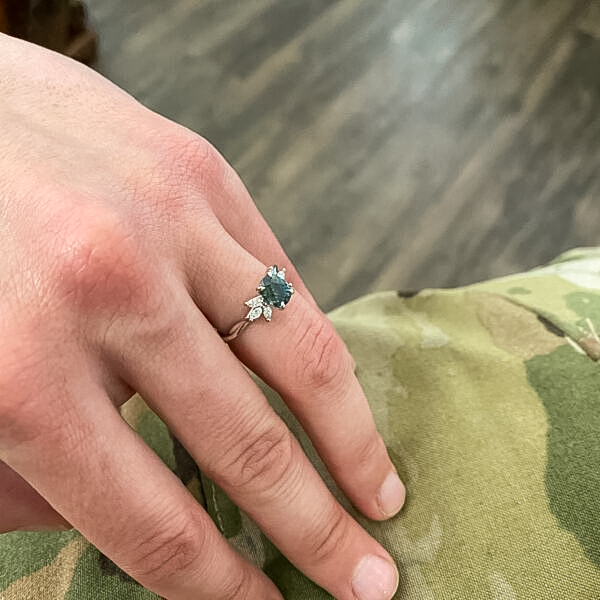 A photo from a customer review featuring a Braided "Liriope" Ring in platinum with 1.16-Carat Montana Sapphire