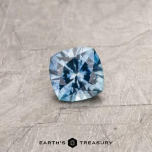 A light blue Montana sapphire in our "Stella" square cushion design