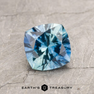 A particolored Montana sapphire in our "Stella" square cushion design