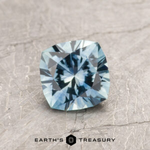 An aqua Montana sapphire in our "Stella" square cushion design