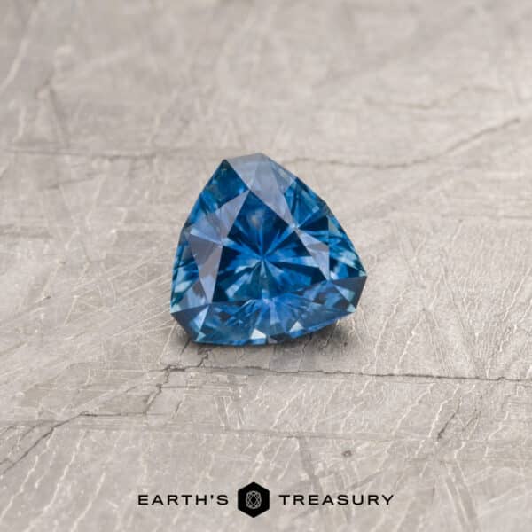 A blue Montana sapphire in our "Triptych" triangle design