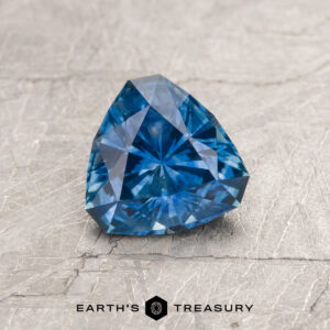 A blue Montana sapphire in our "Aurora" square cushion design