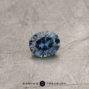 A color change Montana sapphire in our "Serendipity" oval design