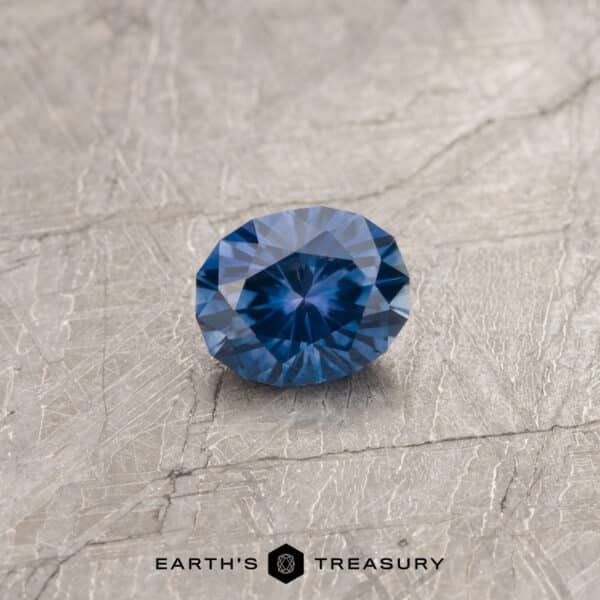 A violet blue Montana sapphire in our "Serendipity" oval design