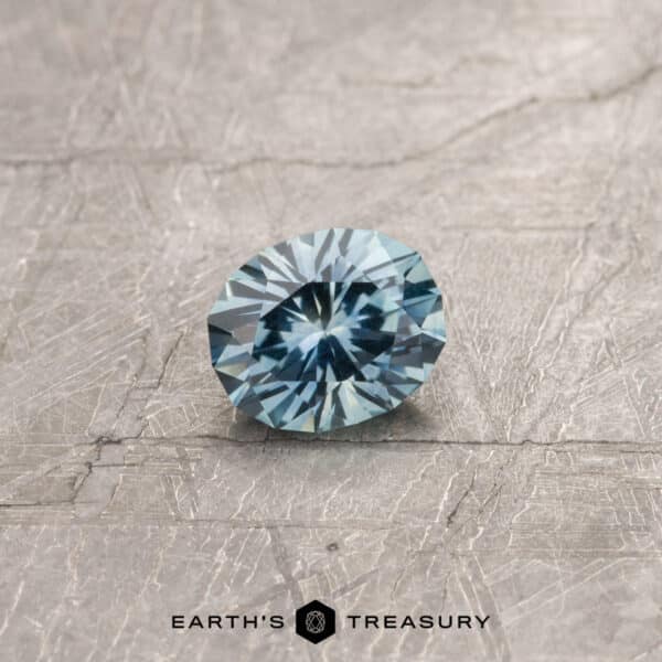 An aqua Montana sapphire in our "Serendipity" oval design
