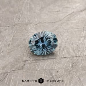 A teal Montana sapphire in our "Serendipity" oval design