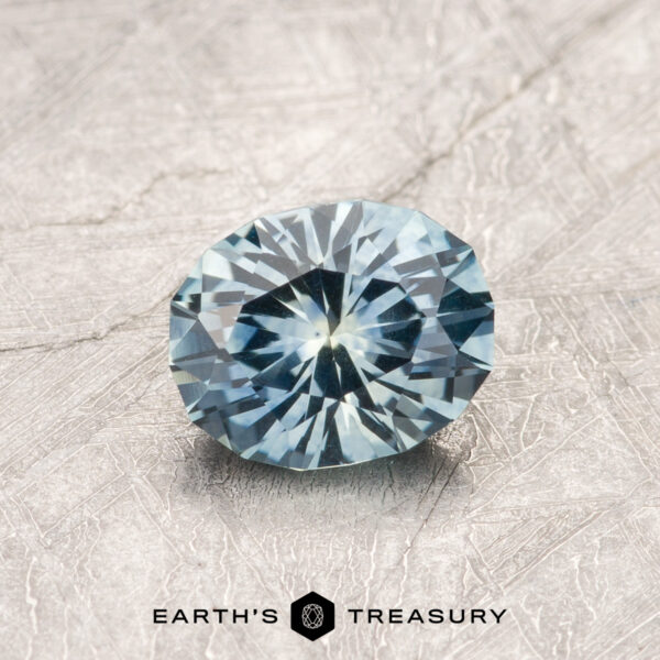 0.81-Carat Montana Sapphire (Heated) An aqua Montana sapphire in our "Serendipity" oval design