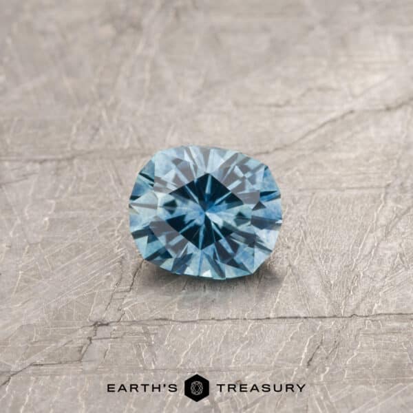 A blue Montana sapphire in our "Hyperbola" oval design