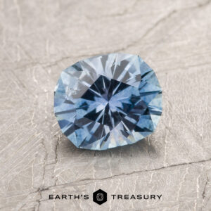 A blue Montana sapphire in our "Hyperbola" oval design