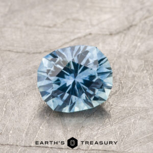 A blue Montana sapphire in our "Hyperbola" oval design