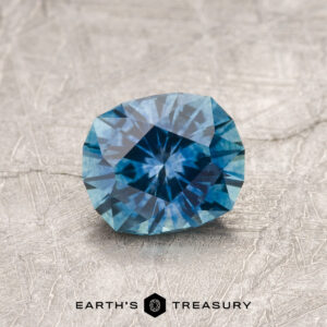 A blue Montana sapphire in our "Hyperbola" oval design