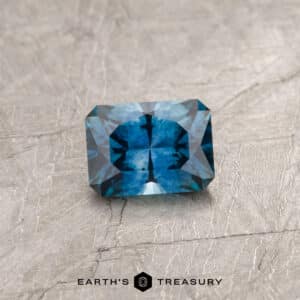 A blue Montana sapphire in our "Fourth of July" rectangle design