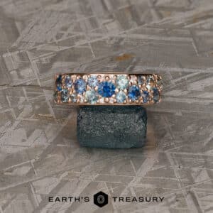 The Thin Borealis Ring in 14k rose gold with Teal Montana Sapphires (Heated)