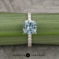 The Deluxe Pave “Madeline” Hidden Halo Ring in 18k white gold with 2.72-Carat Montana Sapphire