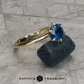 The Minimal "Anemone" in 14k yellow gold with 1.60-carat Montana sapphire