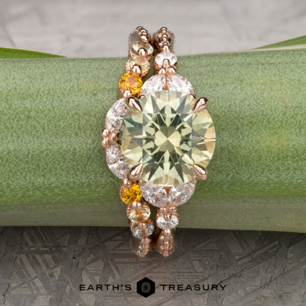 The Ornate "Cattleya" ring in 14k rose gold with 3.35-carat Montana sapphire, alongside the ornate "Cattleya" band in 14k rose gold The Ornate "Cattleya" ring in 14k rose gold with 3.35-carat Montana sapphire, alongside the ornate "Cattleya" band in 14k rose gold