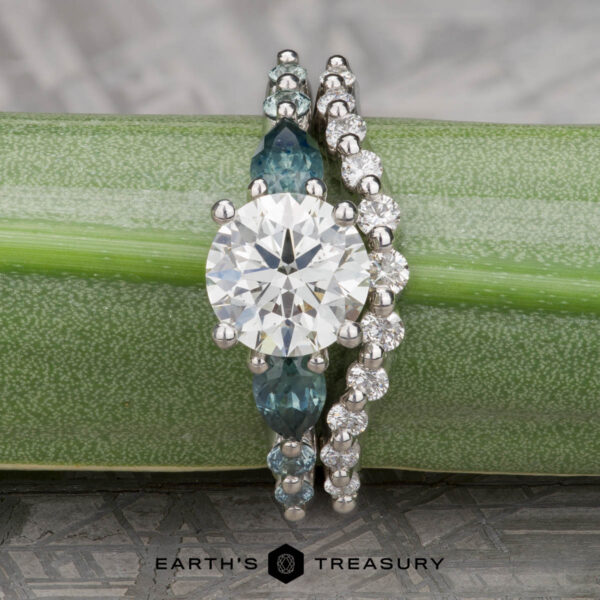 The "Odelia" in platinum with 1.30-carat diamond, alongside the "Odelia" band in platinum The "Odelia" in platinum with 1.30-carat diamond, alongside the "Odelia" band in platinum