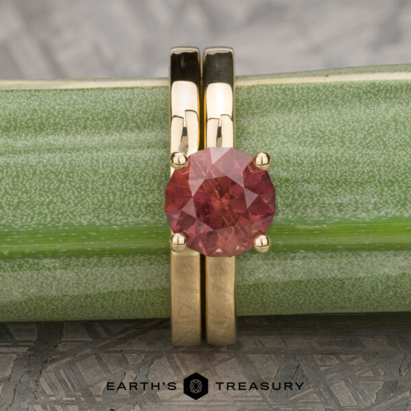 The Custom-Fit Notch Band in 18k yellow gold, alongside the "Clarice" ring in 18k yellow gold with 2.30-carat Umba sapphire The Custom-Fit Notch Band in 18k yellow gold, alongside the "Clarice" ring in 18k yellow gold with 2.30-carat Umba sapphire