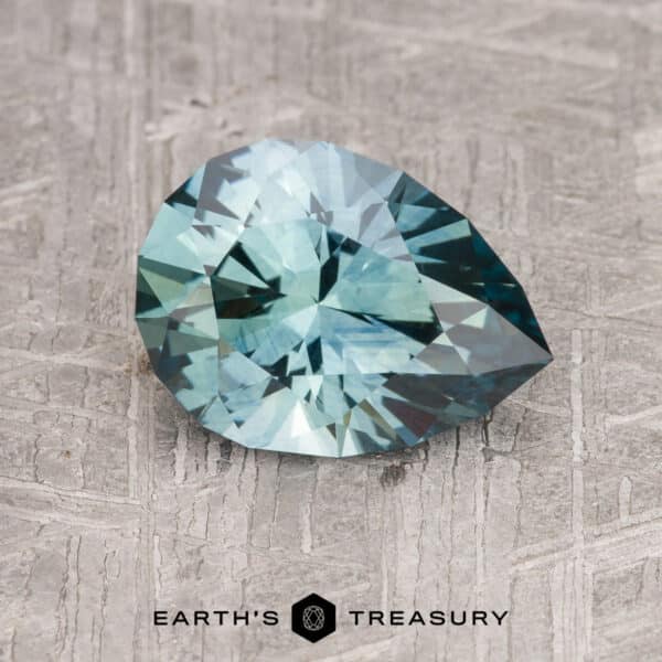 A teal green Montana sapphire in our "Pendeloque" brilliant pear design