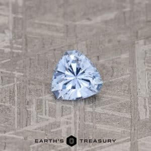 A blue Madagascar sapphire in our "Triptych" trillion design