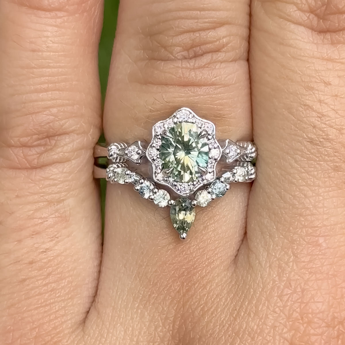 The "Cordelia" ring in 14K white gold with a 1.20-carat Montana sapphire, alongside a custom sapphire "Cordelia" band in 14K white gold