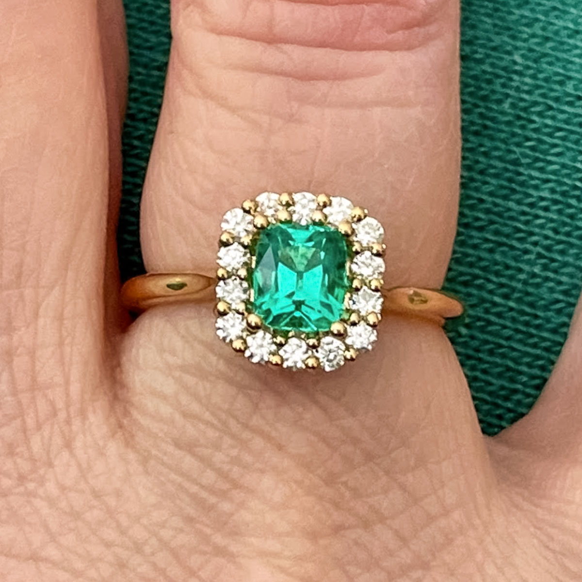 A custom "Anne" ring in 14K yellow gold with 0.71-carat Emerald