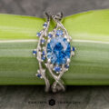 The "Juniper" ring in 14k white gold with 1.48-carat Montana sapphire, alongside the "Juniper" band in 14k white gold