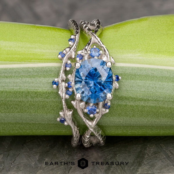 The "Juniper" ring in 14k white gold with 1.48-carat Montana sapphire, alongside the "Juniper" band in 14k white gold The "Juniper" ring in 14k white gold with 1.48-carat Montana sapphire, alongside the "Juniper" band in 14k white gold