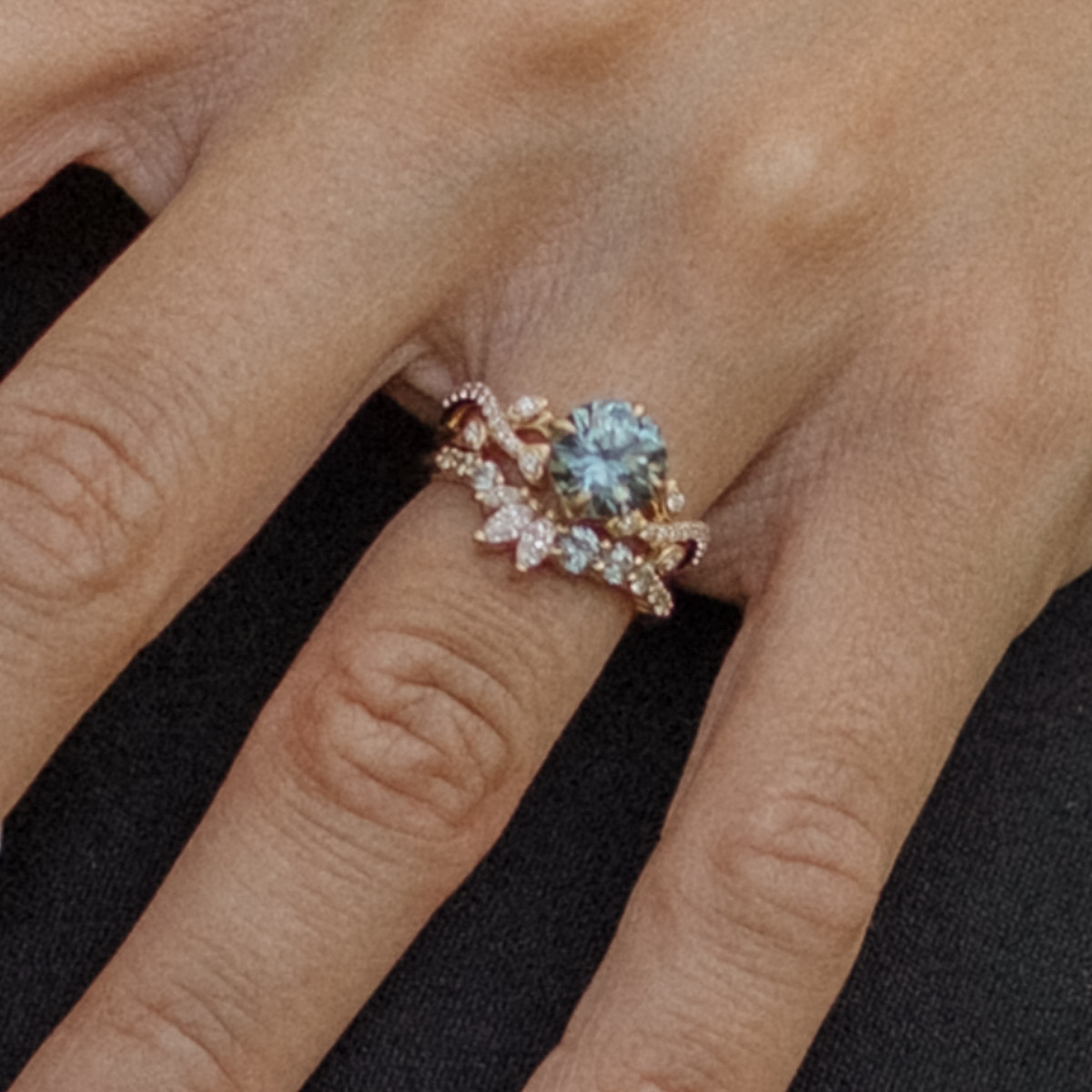 The “Laurel” Ring in 14K yellow gold with 2.10-Carat Montana Sapphire, alongside The "Melisani" band in 14K yellow gold