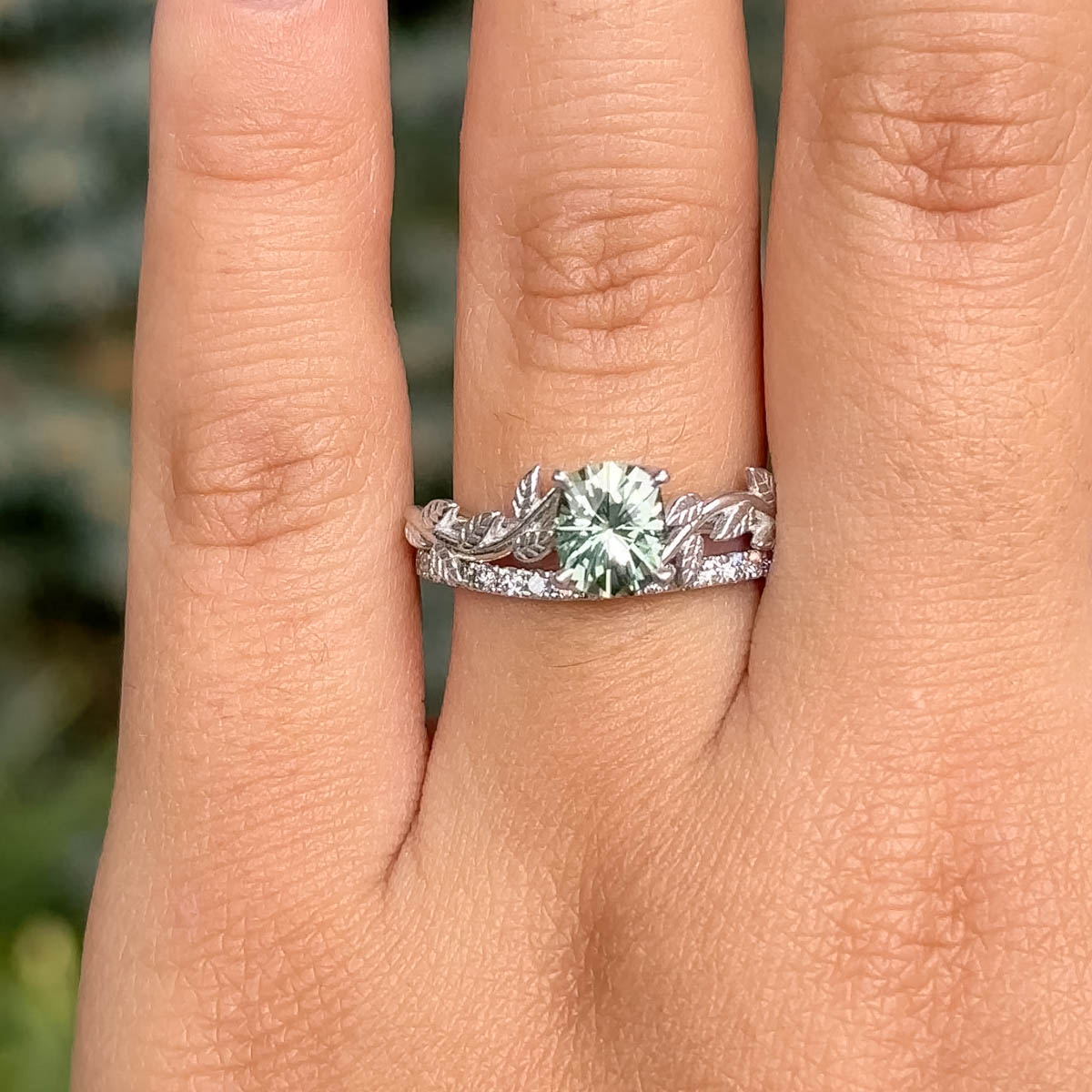 The "Ivey" ring in 14K white gold with a 1.32-carat Montana sapphire, alongside the petite pave diamond contour band in 14K white gold