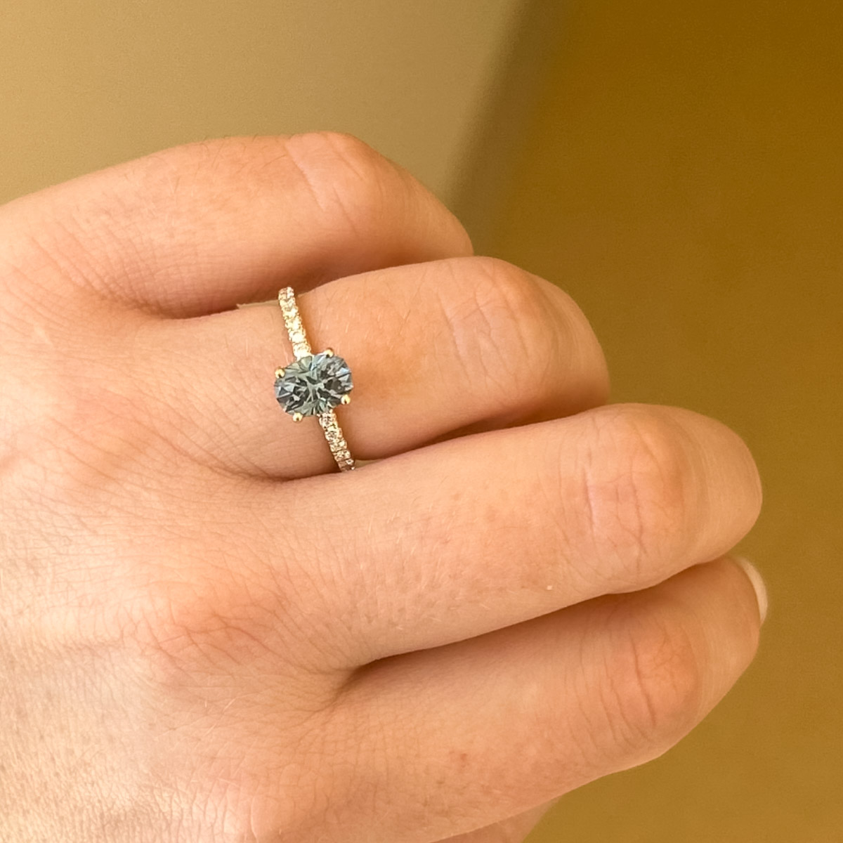 The petite pave "Eugenie" ring in 14K yellow gold with a 1.52-carat Montana sapphire