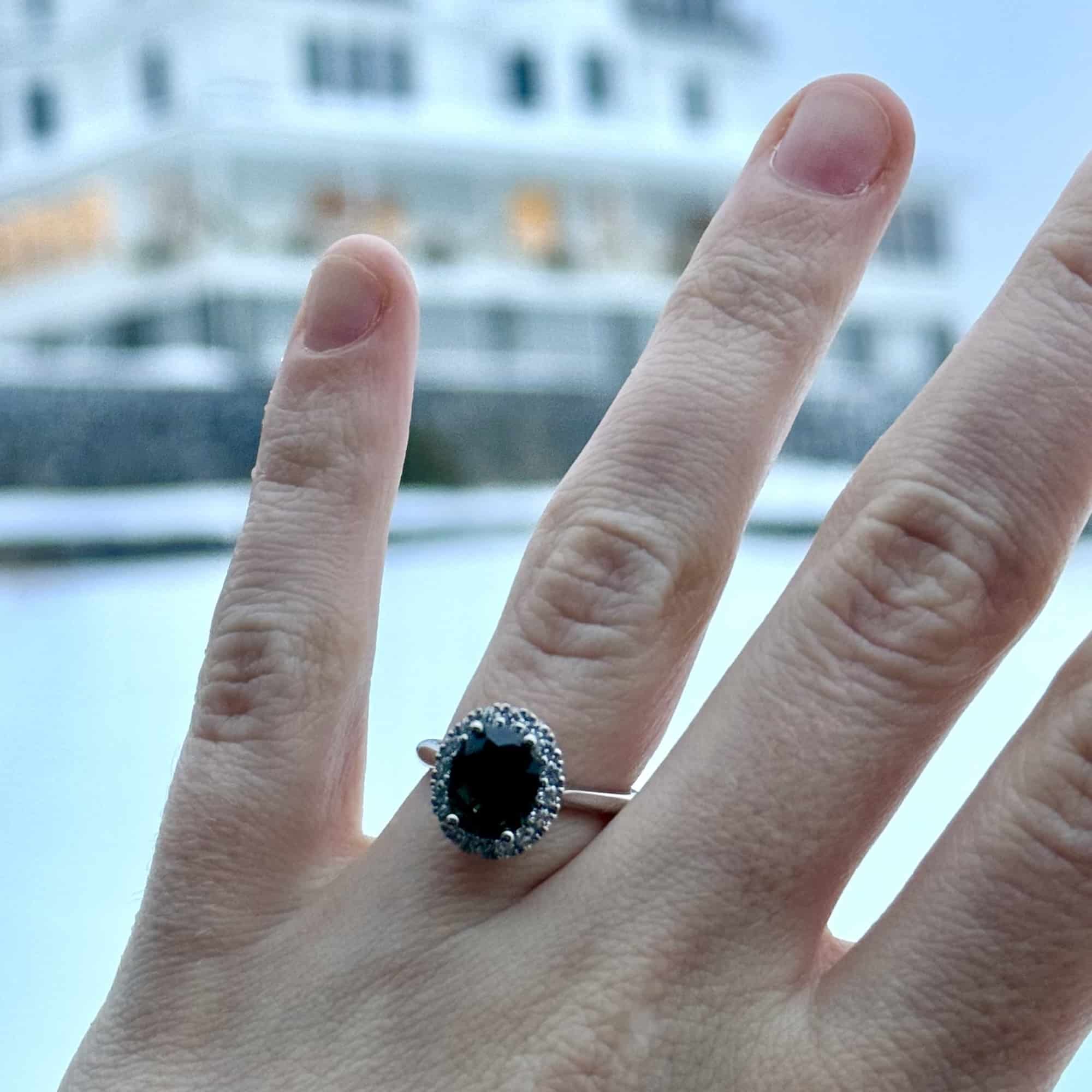 A photo from a customer review featuring a custom ring in platinum with a 2.59-carat Australian sapphire
