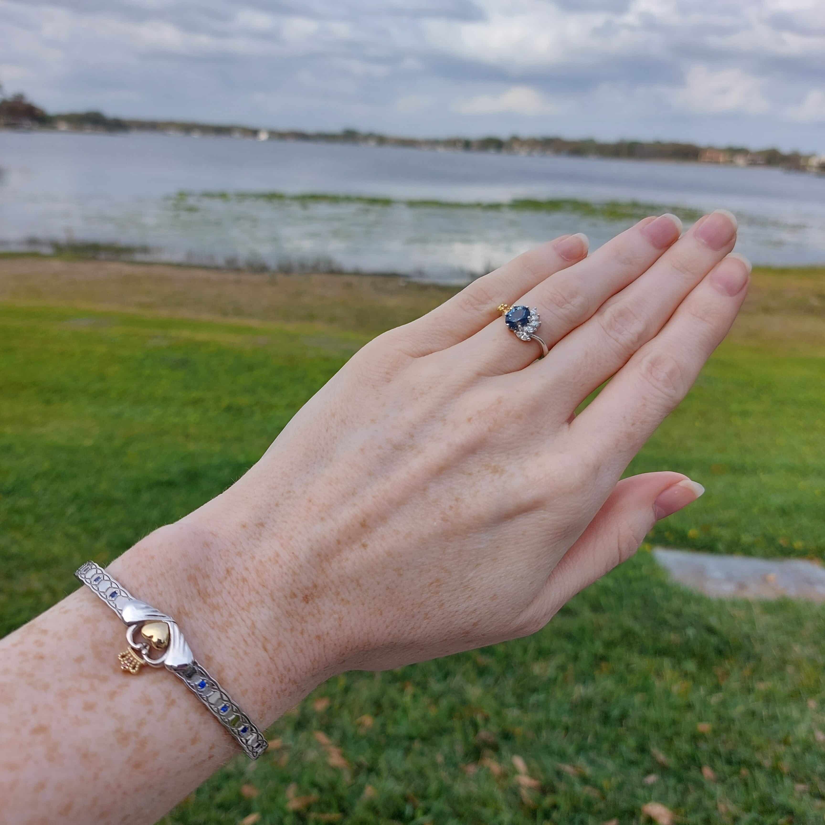 A photo from a customer review featuring a custom two-tone engagement ring and bracelet