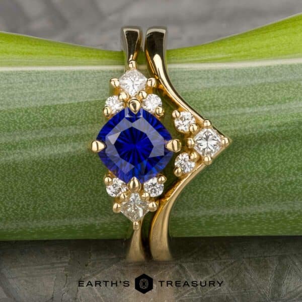 The Bypass "Sappho" ring in 18k yellow gold with 1.05-Carat Ceylon Sapphire, alongside the "Sappho" band in 18k yellow gold The Bypass "Sappho" ring in 18k yellow gold with 1.05-Carat Ceylon Sapphire, alongside the "Sappho" band in 18k yellow gold
