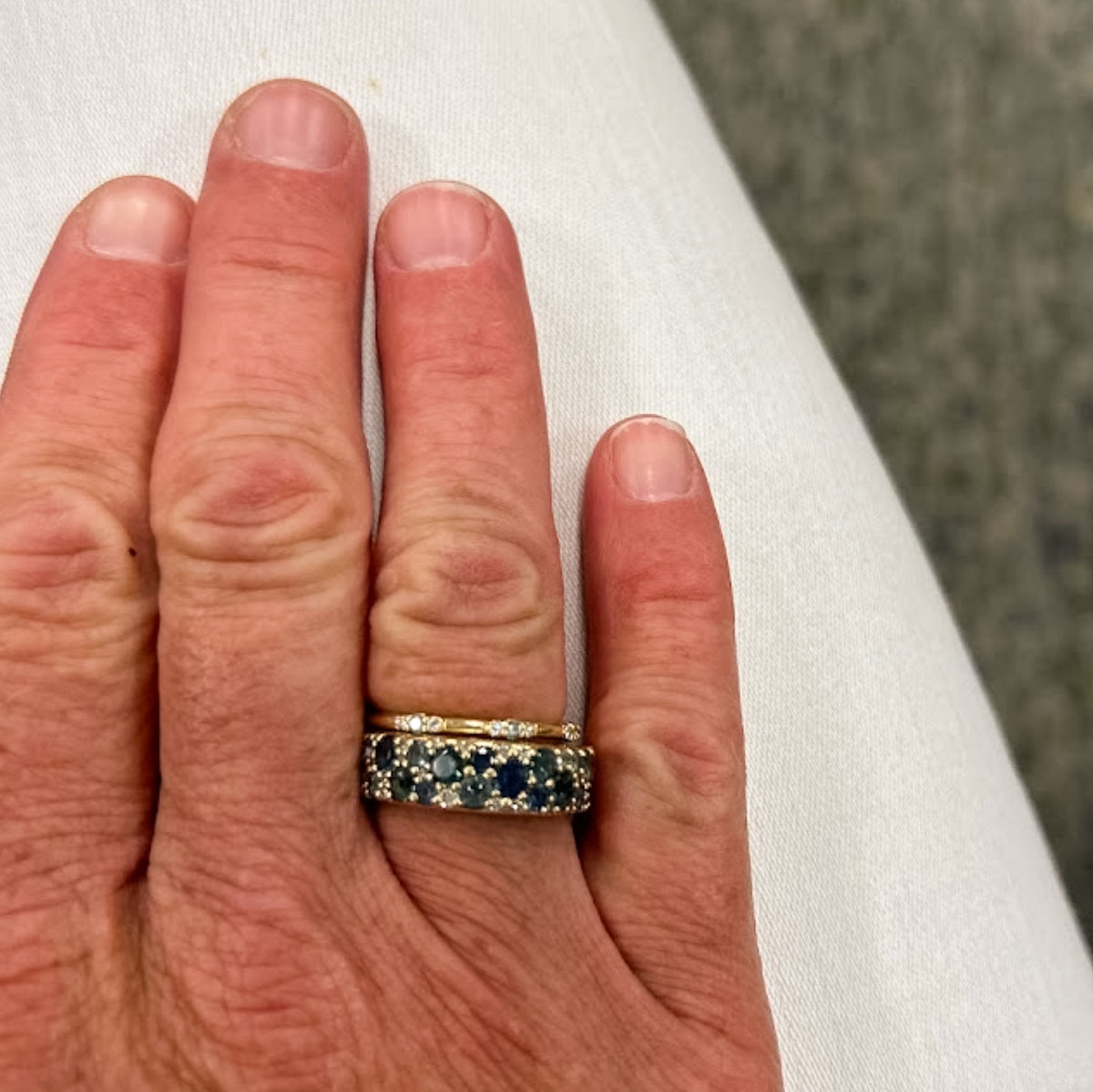 The thin "Borealis" ring in 14K yellow gold and the nine-stone stackable ring in 14K yellow gold