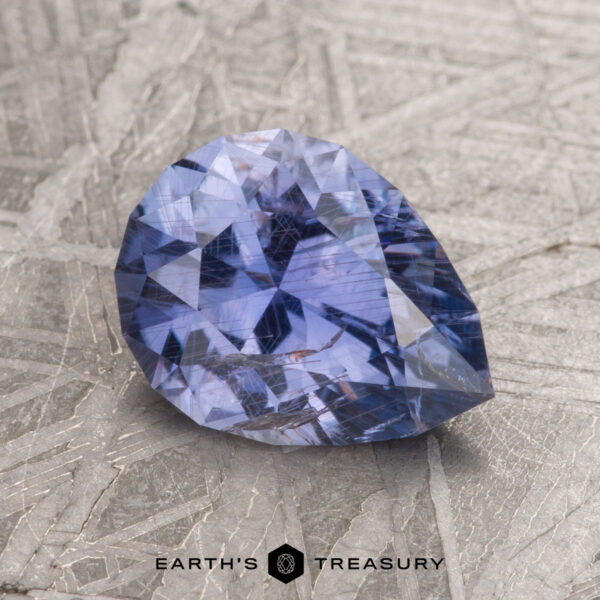 2.04-carat Violet Blue Umba Sapphire A 2.04-carat Violet Blue Umba Sapphire set against a textured metallic surface.
