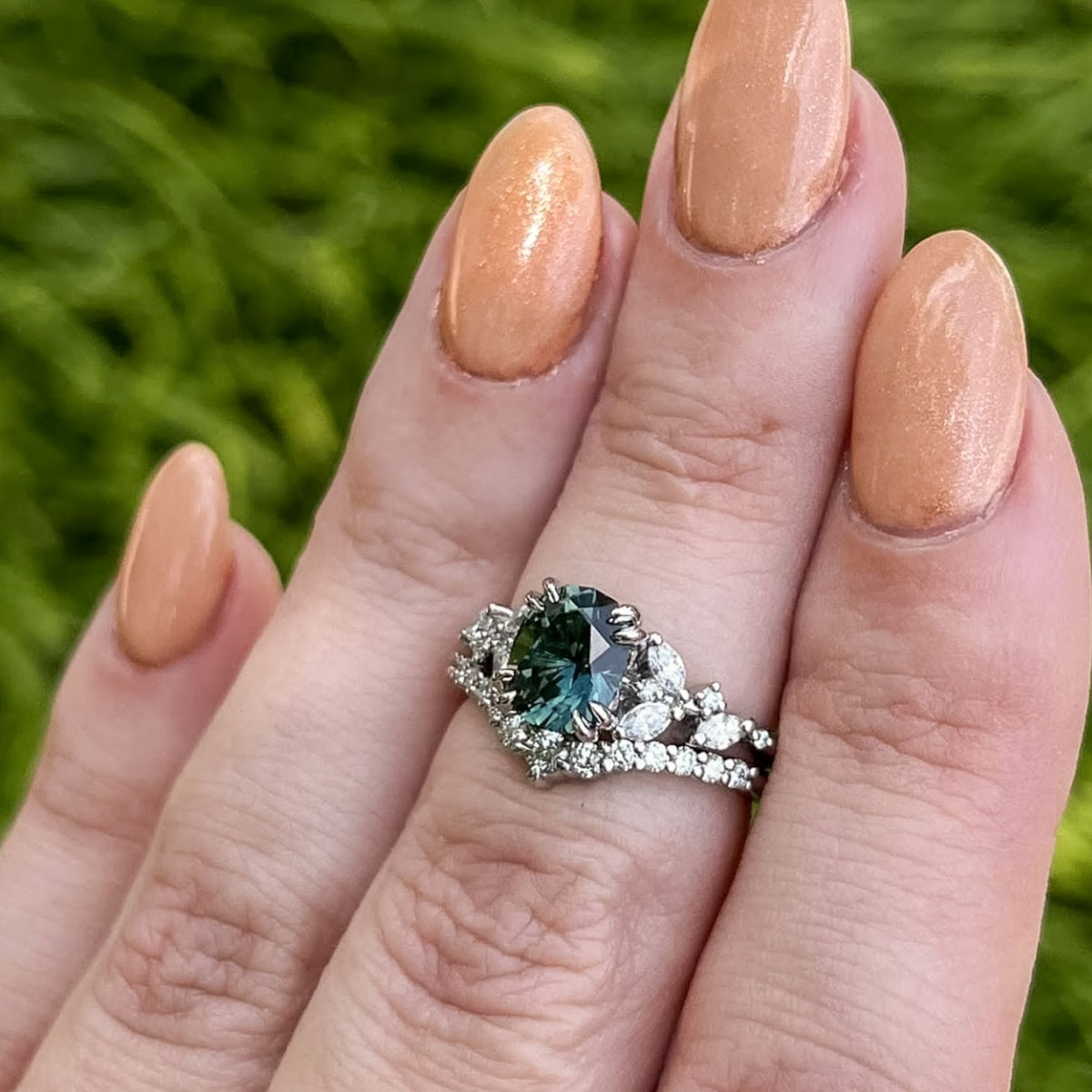 The "Holly" ring in platinum with 1.83-catrat Australian sapphire, alongside a custom "Marseille" band in platinum