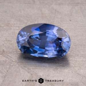 1.75-carat Ceylon sapphire (heated) on a textured surface.