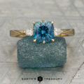 The Sylph Ring featuring a 1.46-Carat Peacock Blue Montana Sapphire set in 18K Yellow Gold
