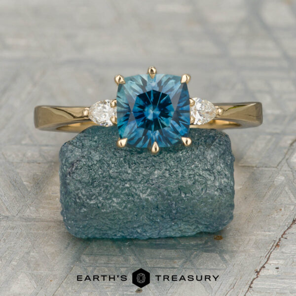 The Sylph Ring featuring a 1.46-Carat Peacock Blue Montana Sapphire set in 18K Yellow Gold The Sylph Ring featuring a 1.46-Carat Peacock Blue Montana Sapphire set in 18K Yellow Gold
