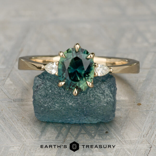 The Sylph Ring featuring a 1.61-Carat Teal-Green Particolored Australian Sapphire in 14K Yellow Gold The Sylph Ring featuring a 1.61-Carat Teal-Green Particolored Australian Sapphire in 14K Yellow Gold