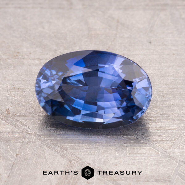 1.75-Carat Ceylon Sapphire (Heated) 1.75-carat Ceylon sapphire (heated) on a textured surface.