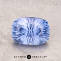 A 2.67-carat Ceylon Sapphire with internal patterns rests on a textured surface, with "Earth's Treasury" below.