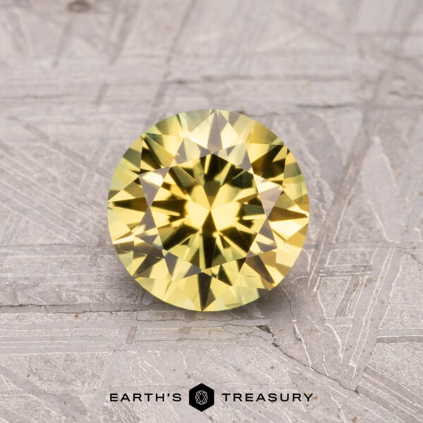 1.15-Carat Australian Sapphire (Heated) 1.15-Carat Australian Sapphire (Heated) showcased on a textured gray surface.