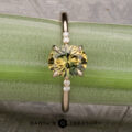 The Kyria ring featuring a 1.56-Carat Yellow-Green Particolored Australian Sapphire set in 14k yellow
