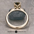 The Kyria ring featuring a 1.56-Carat Yellow-Green Particolored Australian Sapphire set in 14k yellow