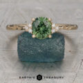 The Aster Ring featuring a 1.28-Carat Lime Green Australian Sapphire set in 14K Yellow Gold