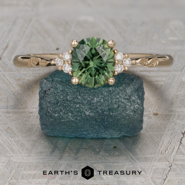 The Aster Ring featuring a 1.28-Carat Lime Green Australian Sapphire set in 14K Yellow Gold The Aster Ring featuring a 1.28-Carat Lime Green Australian Sapphire set in 14K Yellow Gold