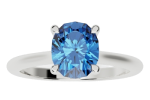 The ring-solitaire is a silver ring with a large oval-cut blue gemstone secured by four prongs.