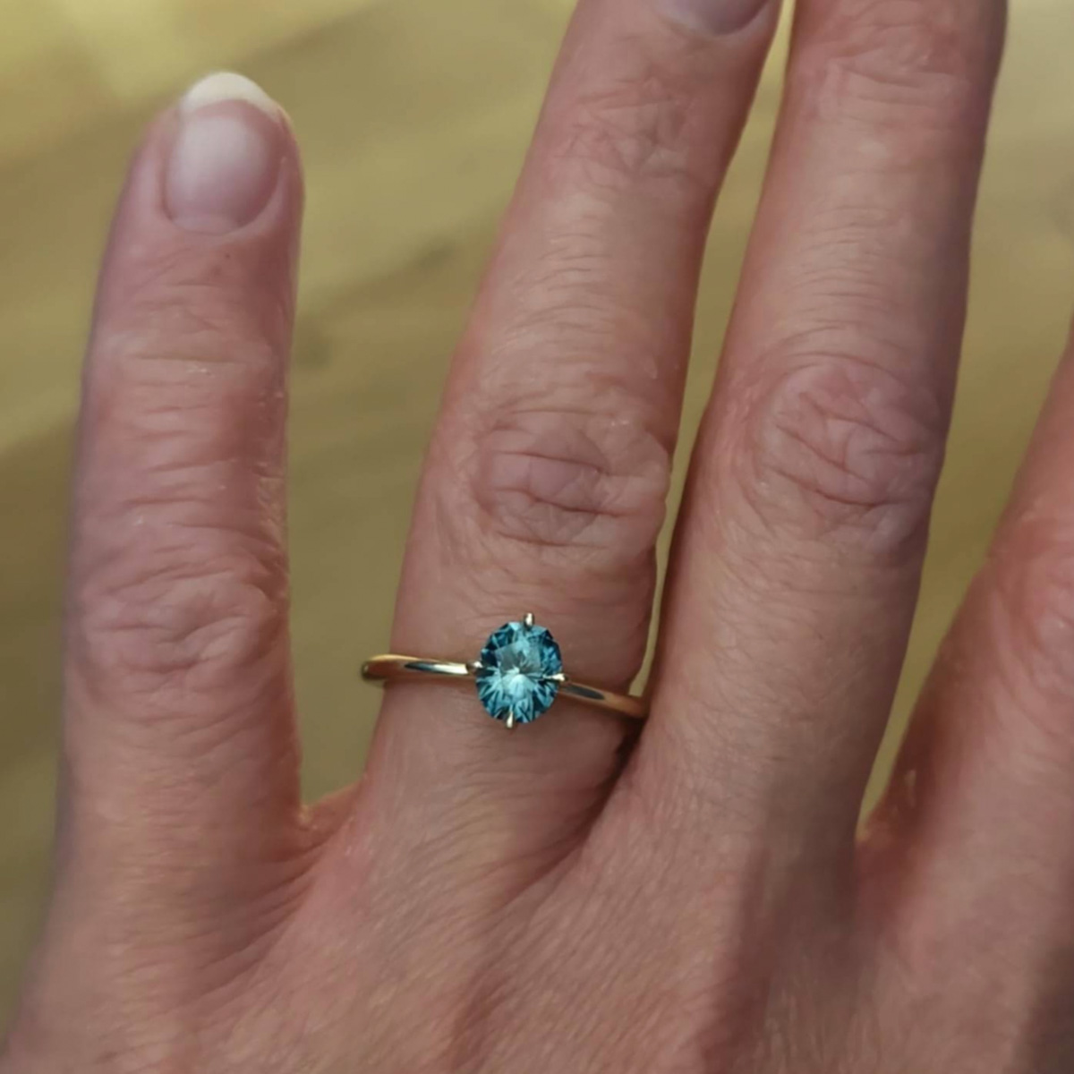 The "Alyssum" ring in 14K yellow gold with 1.13-Carat Montana Sapphire